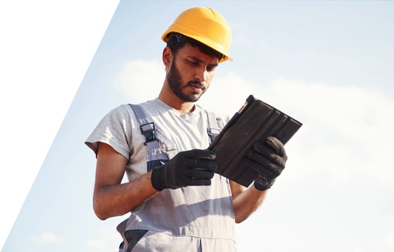 A plumber on a job scheduled with Zuper's plumbing scheduling software